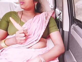 Torrid Silk's Indian bhabi gets the brush cock-squeezing gash poked while driving with the brush BOYFRIEND